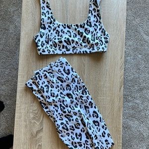 Cheetah print workout bra and leggings.